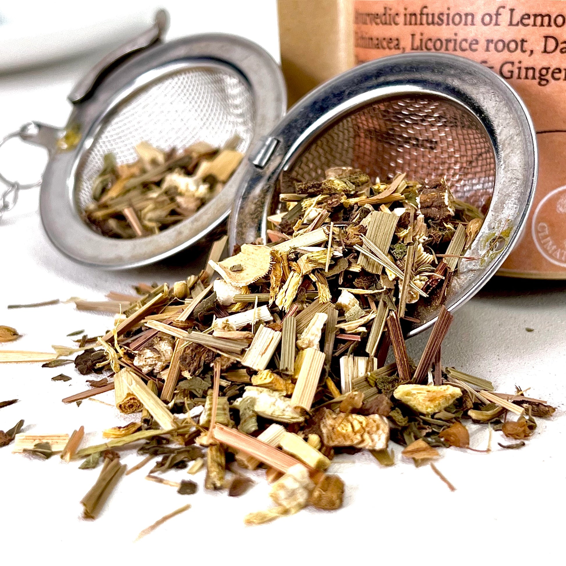 A loose leaf tea mix with Lemongrass, Echinacea, Licorice root, Dandelion,  Peppermint, Tulsi, & Ginger in a tea ball